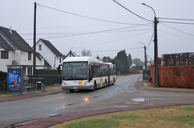 Foto van DeLijn Van Hool AG300 4654 Gelede bus door mauricehooikammer